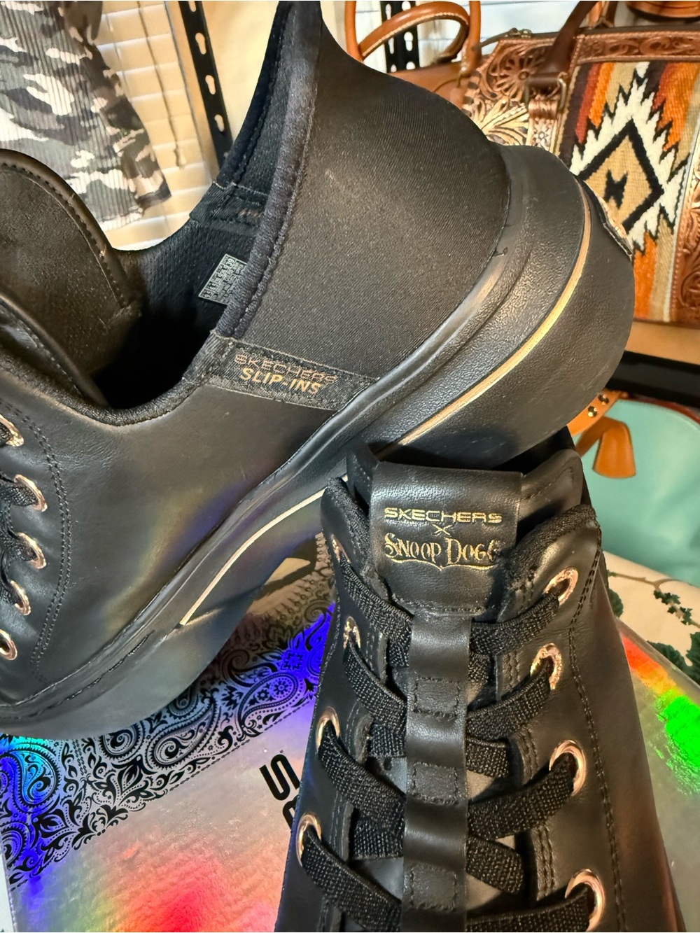 Snoop Dog slip in Skechers Black Leather Low-Top Sneakers with Rose Gold Accents - Picture 2 of 9